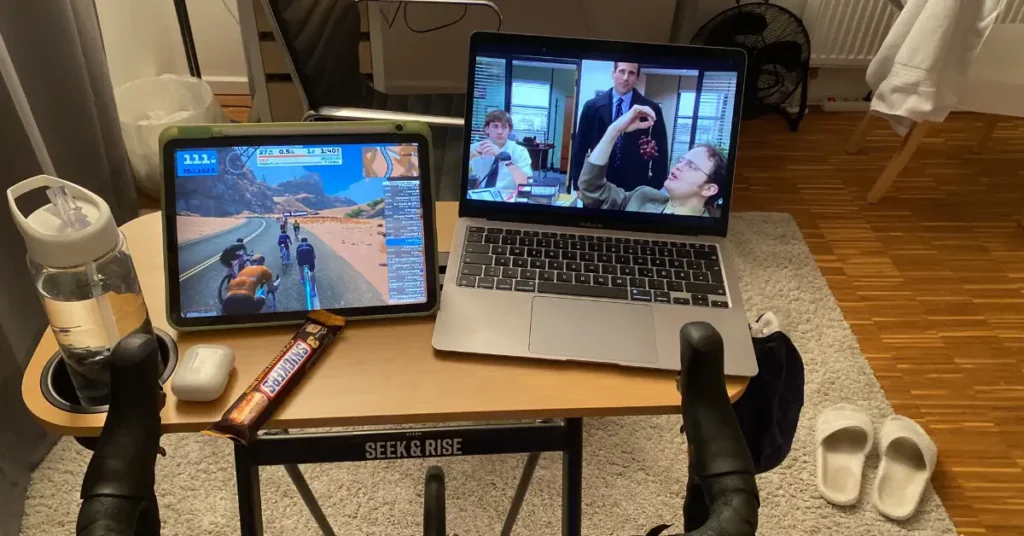 my personal indoor bike setup with ipad, zwift and laptop