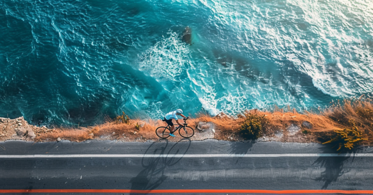 What is an Ironman Run: The Ultimate Challenge in 2024! 8 top view of race bike besides ocean